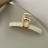 klamra biała ze złotą ozdobą 11cm SP304B